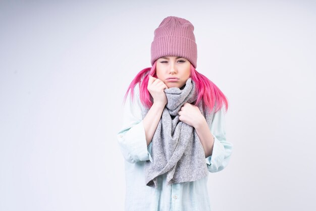 Freezing girl with scarf and rose hat
