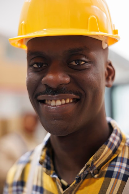 Free photo freight distribution african american smiling worker smiling face portrait