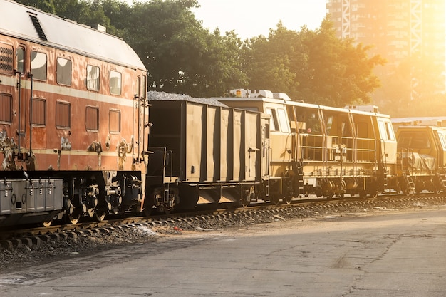 Free photo freight train at sunset