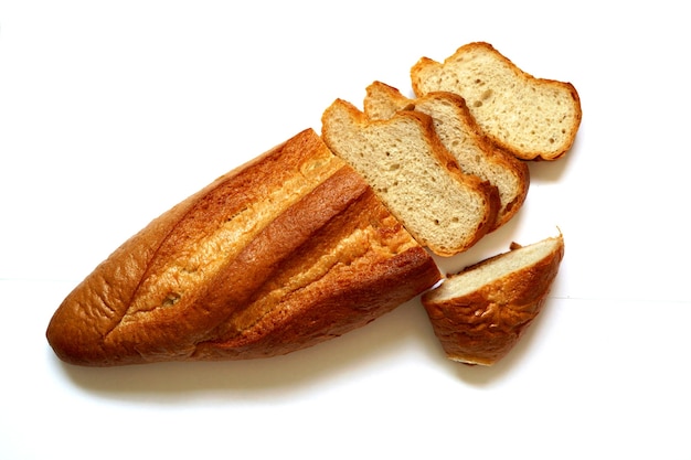 French bread sliced on white background