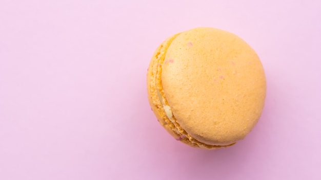 French cake macaron on pink background tasty fruit almond sweet cookie