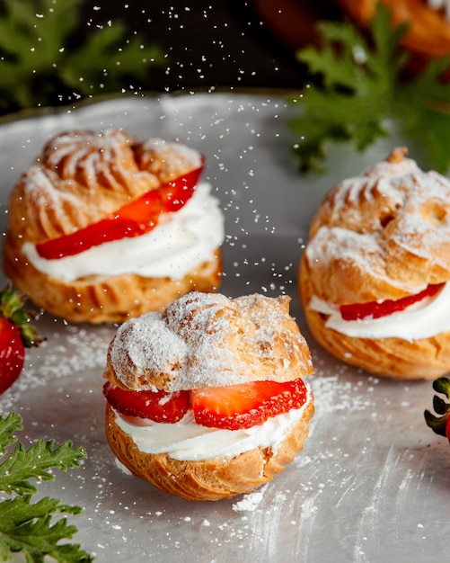 French choux pastry with white cream and strawberries
