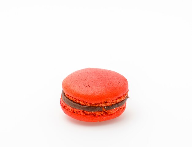 French colorful macarons on white background .