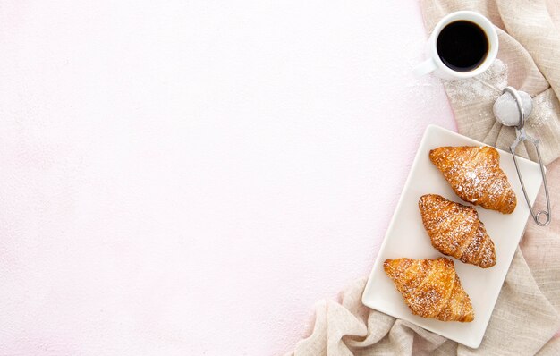 French croissants and coffee copy space