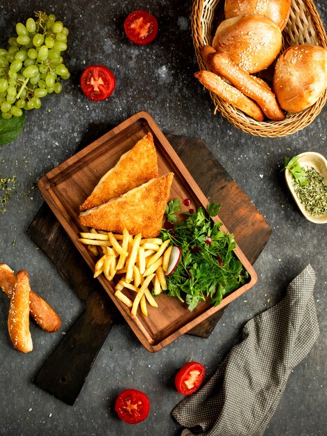 French fries and chicken with cream cheese in batter