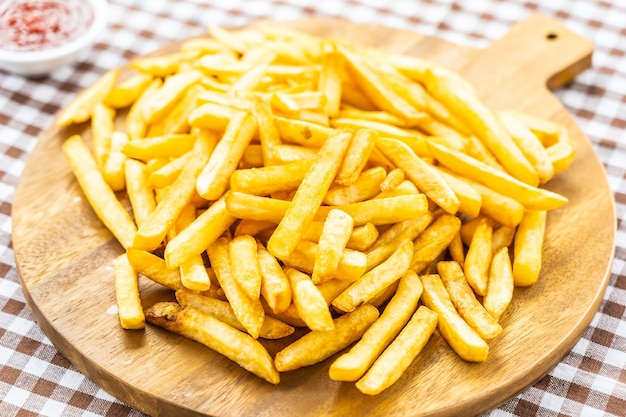 French fries with tomato or ketchup sauce