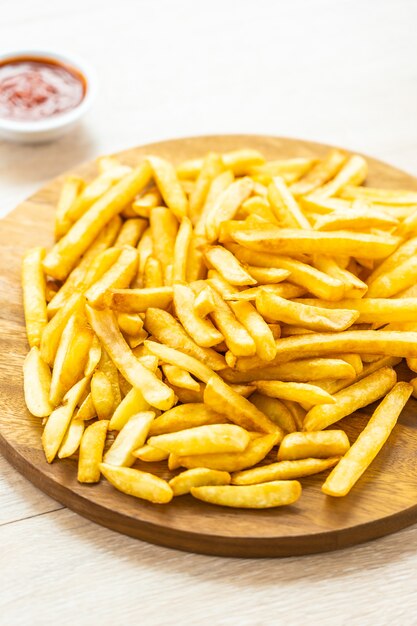 French fries with tomato or ketchup sauce
