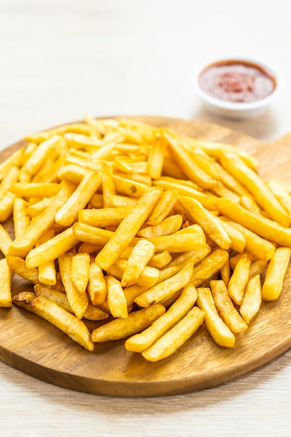 French fries with tomato or ketchup sauce