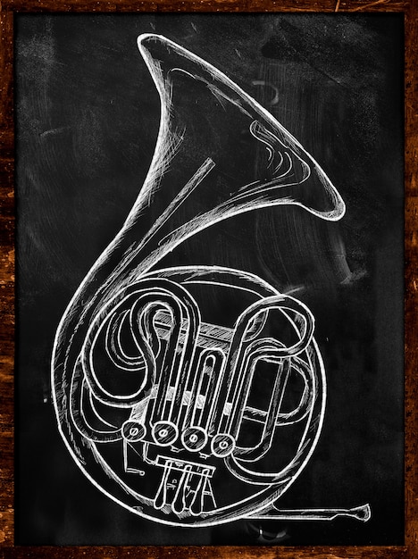 Free photo french horn drawing on blackboard