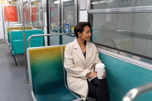 French woman riding the subway train