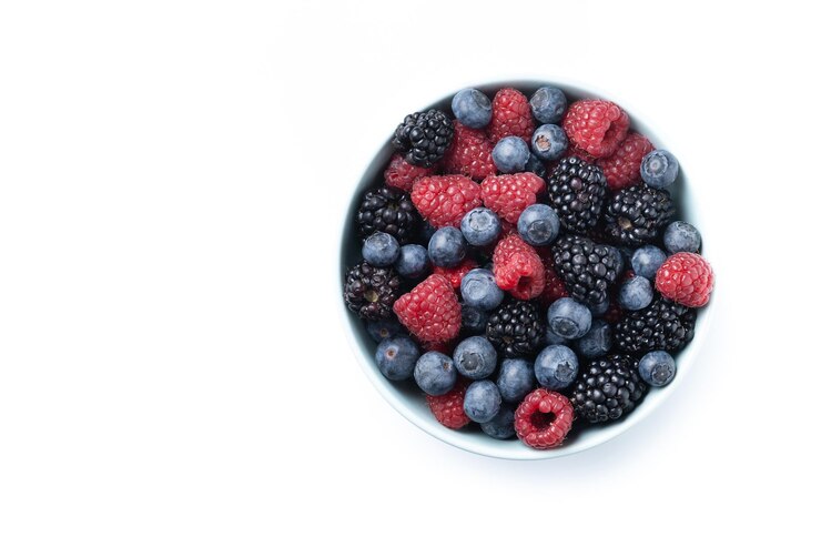 Free Photo fresh assortment berries isolated on white background