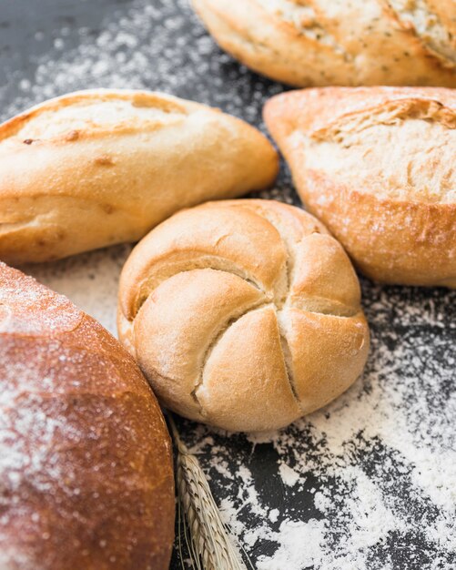 Fresh bread loafs on table