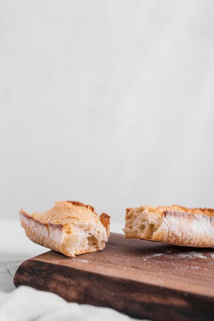 Fresh bread with cutting board