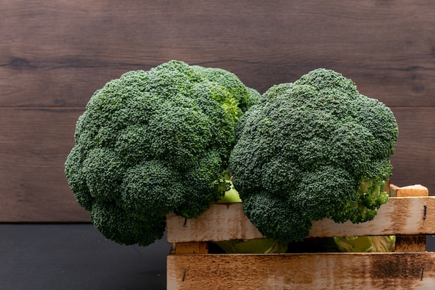 Fresh broccoli in wooden box