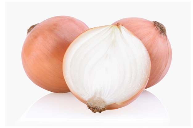 Fresh bulbs of onion with cut in half isolated on white background