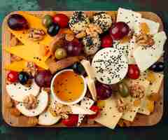 Free photo fresh cheese plate top view