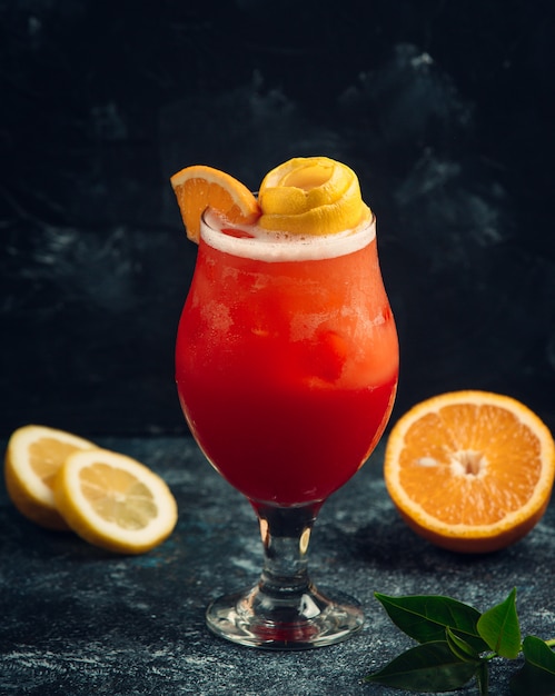 Fresh cocktail with orange and berries