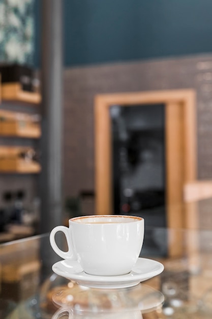 Fresh coffee on glass counter in restaurant