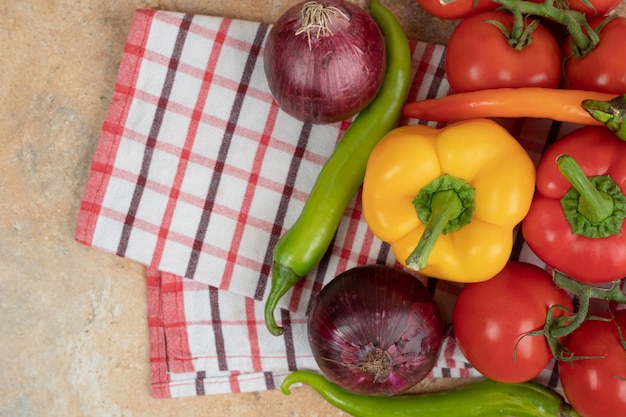 Fresh colorful vegetables on tablecloth.