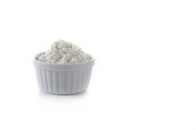 Fresh cottage cheese isolated on white background