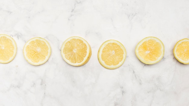 Fresh cut slices of lemon top view