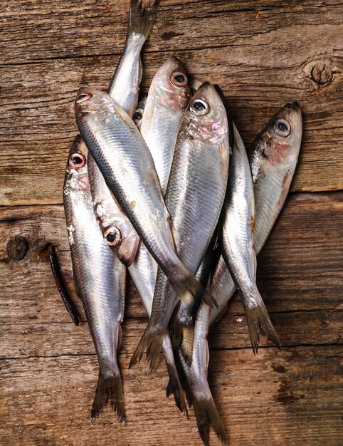 fresh delicious fish on wooden table