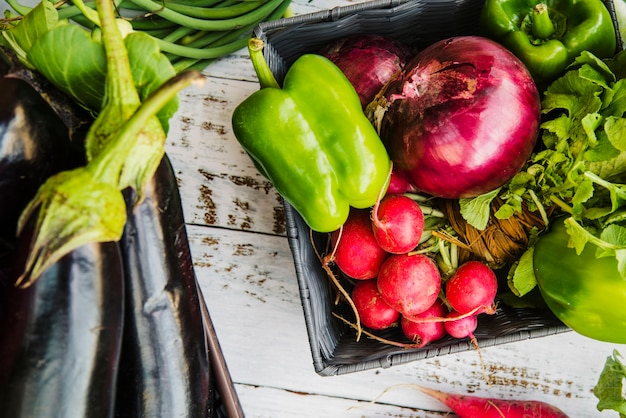 Fresh farm vegetable on wooden desk