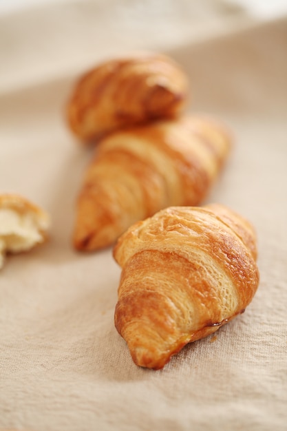 Fresh french croissants on a tablecloth