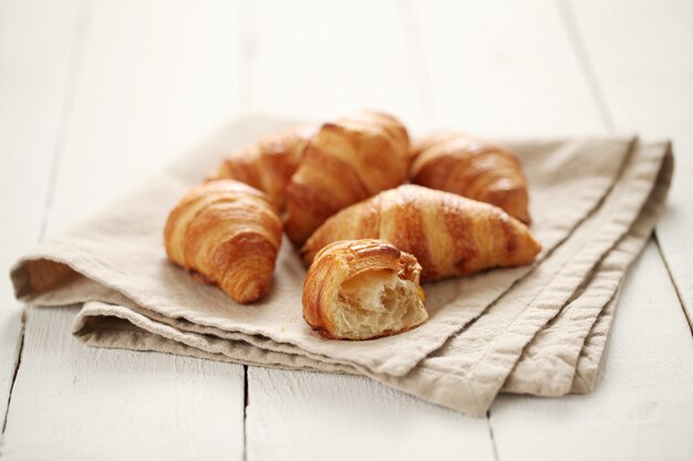 Fresh french croissants on a tablecloth