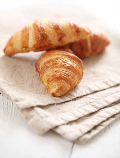 Fresh french croissants on a tablecloth