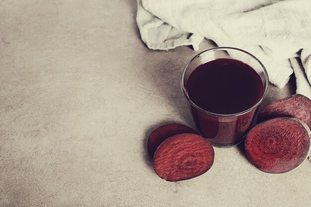 Free photo fresh fruit juice and beetroot