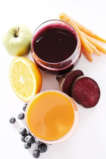 Free photo fresh fruit juices and fruits