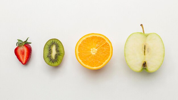 Fresh fruits arrangement flat lay