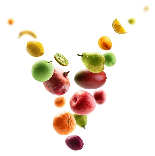 Fresh fruits levitate on a white background