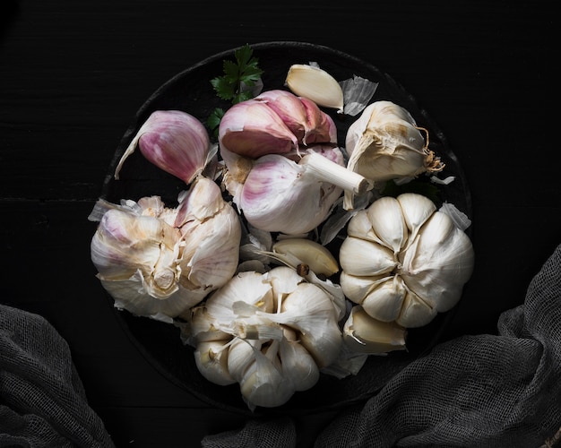 Fresh garlic bulbs flat lay