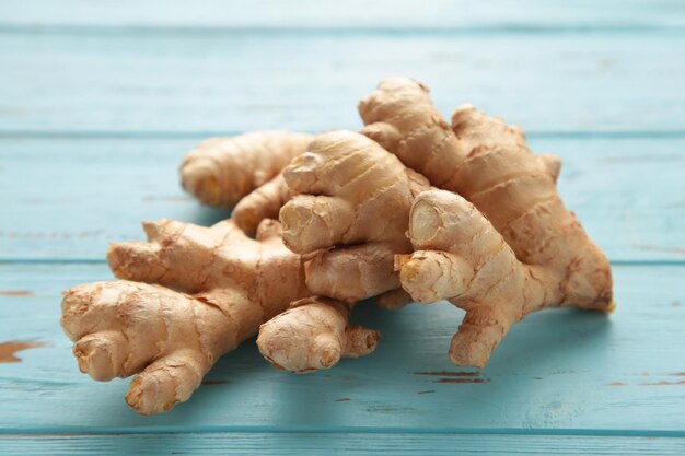 Premium Photo Fresh Ginger On A Blue Background Healthy Food
