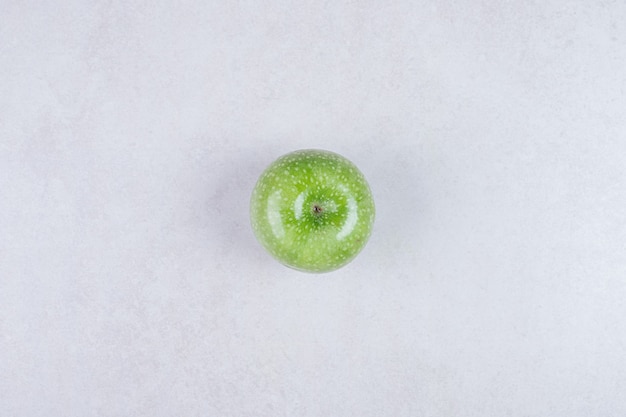 Fresh green apple on white background.