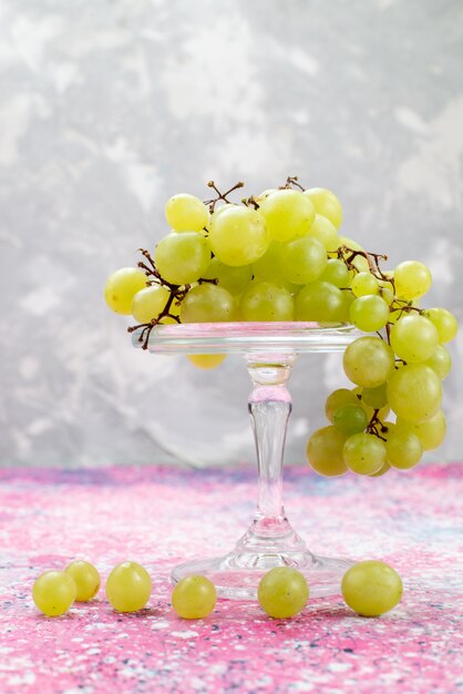 fresh green grapes whole sour and delicious fruits on light