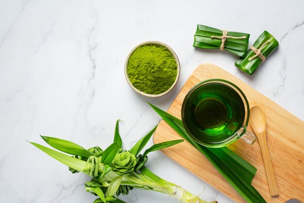 Fresh green pandan leaf on table