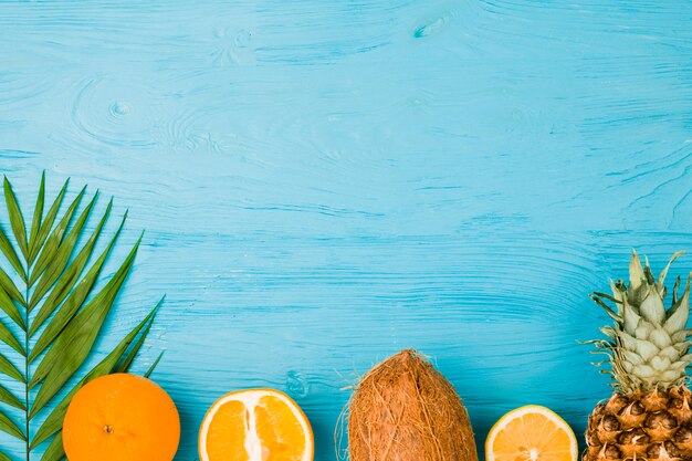 Fresh green plant leaf and exotic fruits