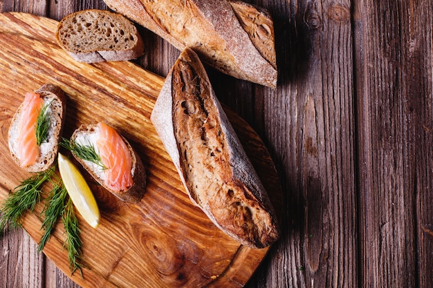 Fresh and healthy food. Snack or lunch ideas. Homemade bread with lemon and salmon