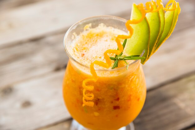 Fresh juice on wooden desk