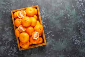 Free photo fresh juicy clementine mandarins.