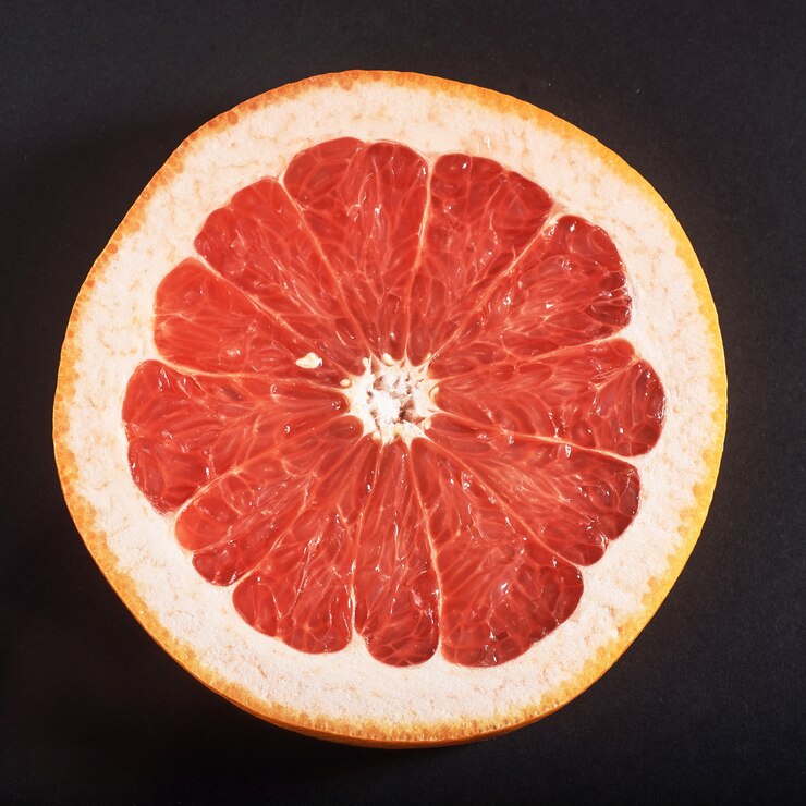 Free Photo fresh juicy grapefruit slices.