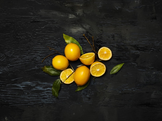 fresh lemons on black background
