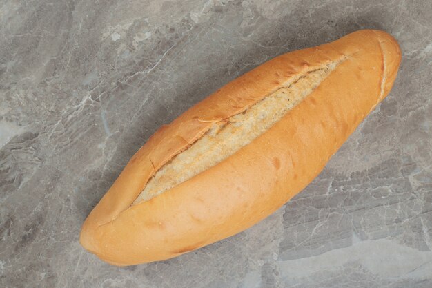 Fresh loaf bread on marble. High quality photo