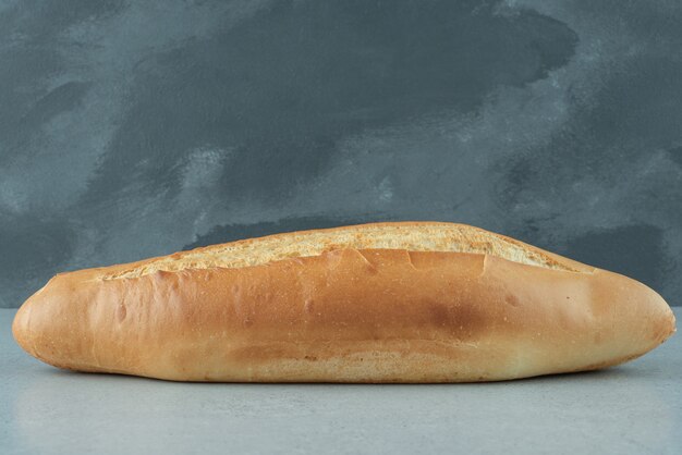 Fresh loaf bread on stone table