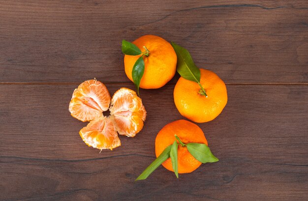 Fresh mandarin on wooden surface