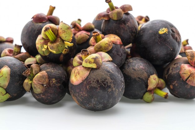 fresh mangosteen on white