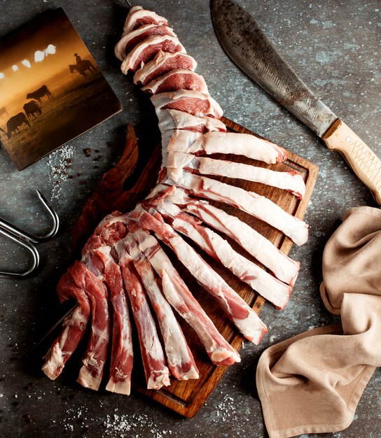 Fresh meat ribs on wooden board